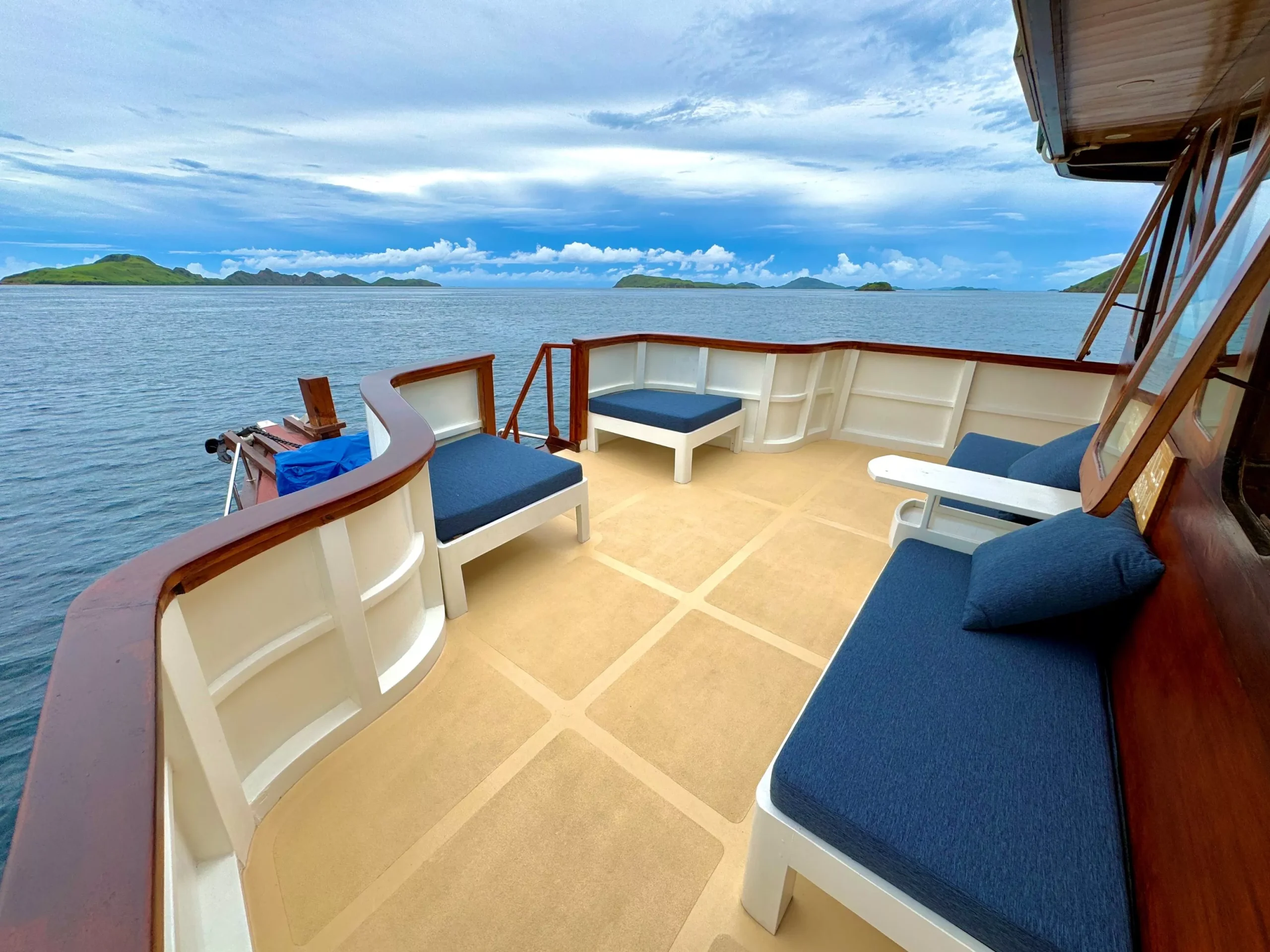 Nomad Archipelago liveaboard relaxing front deck