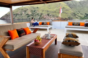 boat sundeck loungers woman reading scenic view relaxing tropical