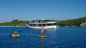 liveaboard boat kayak paddleboard tropical water island activities